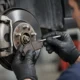 how to check brake pads properly featured 80x80